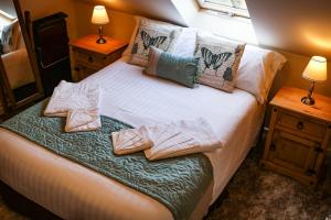 Кровать или кровати в номере The Shoulder Of Mutton Inn