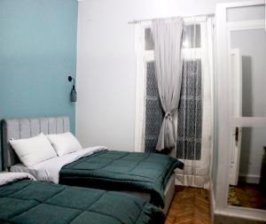 Voodi või voodid majutusasutuse Cheers Hostel Cairo toas