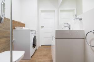 Łazienka w obiekcie Luksusowy apartament przy Targach