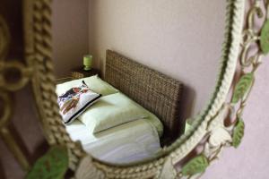 Postel nebo postele na pokoji v ubytování Une Parenthèse en Champagne