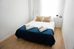 Ένα ή περισσότερα κρεβάτια σε δωμάτιο στο Ronda Chic Apartments - C/ Lauria - Centro ciudad