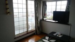 Guest House Marine Blue / Vacation STAY 1405 TV 또는 엔터테인먼트 센터