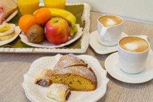 Opções de café da manhã disponíveis para hóspedes em Zefiro Home