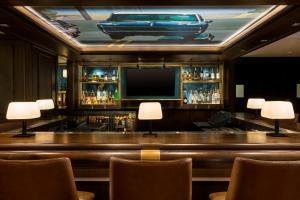 a bar in a hotel room with a boat on the ceiling at Stanford Court San Francisco in San Francisco