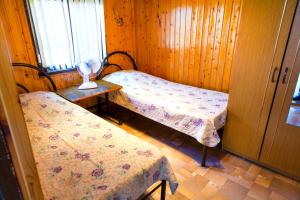 Cama o camas de una habitación en Guest House U Larisy