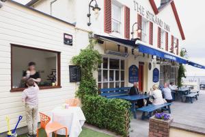 Restavracija oz. druge možnosti za prehrano v nastanitvi The Strand Inn