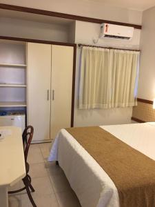 Postel nebo postele na pokoji v ubytování Portal da Princesa Hotel