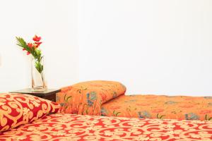 Uma cama ou camas num quarto em I Leoncini