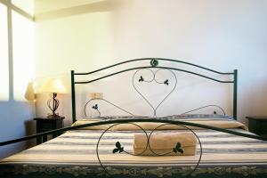 Uma cama ou camas num quarto em I Leoncini