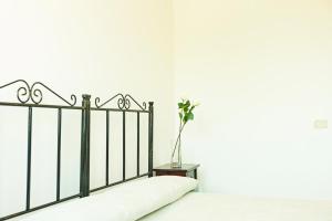 Uma cama ou camas num quarto em I Leoncini