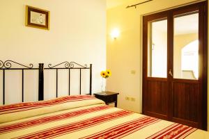 Uma cama ou camas num quarto em I Leoncini