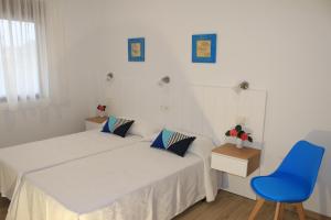 Katil atau katil-katil dalam bilik di Apartamentos As Lagoas