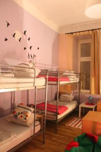 Posteľ alebo postele v izbe v ubytovaní Hostel Centrum Sabot