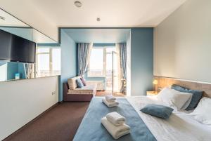 Postel nebo postele na pokoji v ubytování Mini-hotel People