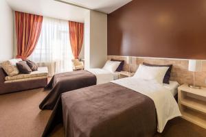 Postel nebo postele na pokoji v ubytování Mini-hotel People