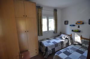 Postel nebo postele na pokoji v ubytování 60 Carrer Tomàs Breton
