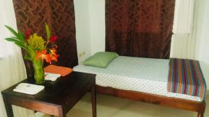 Postelja oz. postelje v sobi nastanitve Hotel & Hostal Yaxkin Copan