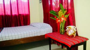 Postelja oz. postelje v sobi nastanitve Hotel & Hostal Yaxkin Copan