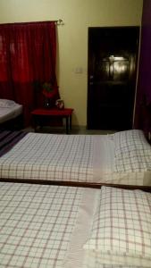 Postelja oz. postelje v sobi nastanitve Hotel & Hostal Yaxkin Copan