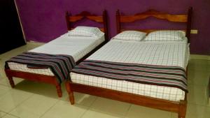 Postelja oz. postelje v sobi nastanitve Hotel & Hostal Yaxkin Copan