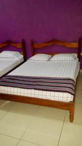 Postelja oz. postelje v sobi nastanitve Hotel & Hostal Yaxkin Copan
