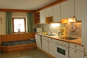Kuchyňa alebo kuchynka v ubytovaní Appartement Mox