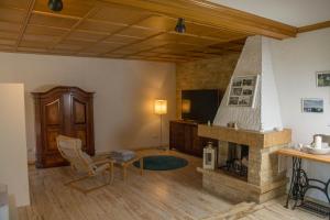 TV a/nebo společenská místnost v ubytování Landhotel Sonneneck - Breuna im Naturpark