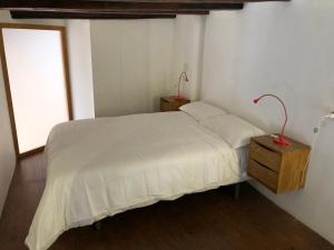 Ein Bett oder Betten in einem Zimmer der Unterkunft Cozy en Blanch. Center