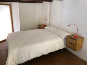 Ein Bett oder Betten in einem Zimmer der Unterkunft Cozy en Blanch. Center