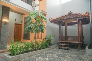 Foto da galeria de M Stay Guest House Jogja em Yogyakarta