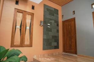 Fotografie z fotogalerie ubytování M Stay Guest House Jogja v destinaci Yogyakarta
