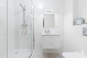 Kúpeľňa v ubytovaní Jantar Apartamenty Bliżej Morza