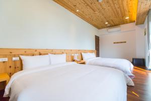 Letto o letti in una camera di Post-mountain view