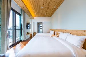 Letto o letti in una camera di Post-mountain view