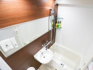 Vonios kambarys apgyvendinimo įstaigoje HOTEL LiVEMAX Sapporo Susukino