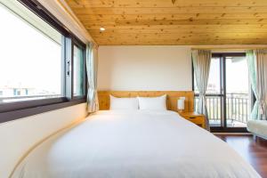 Letto o letti in una camera di Post-mountain view