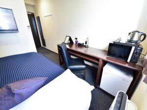 Postel nebo postele na pokoji v ubytování HOTEL LiVEMAX Toyosu-Ekimae + 8 fotografií
