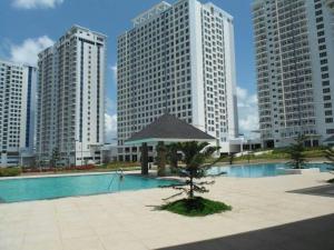 The swimming pool at or close to Taal Lake View Wind Residences by SMCo