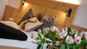 Postel nebo postele na pokoji v ubytování Hotel Moritz