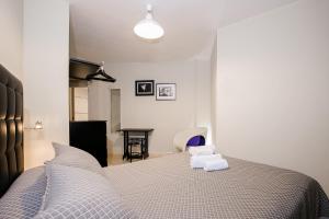Posteľ alebo postele v izbe v ubytovaní Hotel Montmar