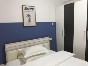 Säng eller sängar i ett rum på ChengPin Apartment