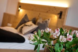 Postel nebo postele na pokoji v ubytování Hotel Moritz