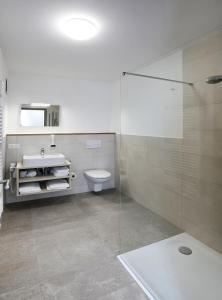 Koupelna v ubytování Apartment Hotel 37