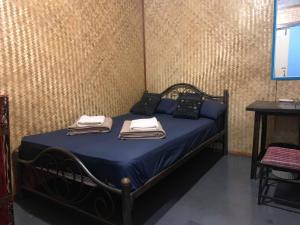 Katil atau katil-katil dalam bilik di J Giant Hostel
