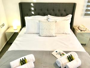 Posteľ alebo postele v izbe v ubytovaní RIQIONIAN House