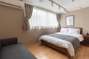 Кровать или кровати в номере Bijou Suites Prestige