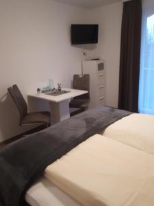 TV a/nebo společenská místnost v ubytování Appartement Roland