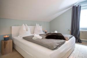 Posteľ alebo postele v izbe v ubytovaní Chalet Happy Family, secluded location, 15 min to salzburg and just short to t lakes sound of music, BBQ&bikes&sunbeds for free, up to 14p