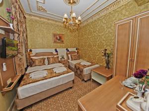 Postel nebo postele na pokoji v ubytování Glamour Classic Hotel Istanbul Sirkeci