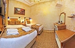 Postel nebo postele na pokoji v ubytování Glamour Classic Hotel Istanbul Sirkeci